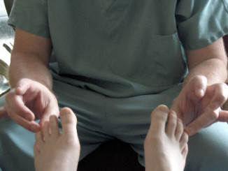 Person doing the Brazilian Toe Technique